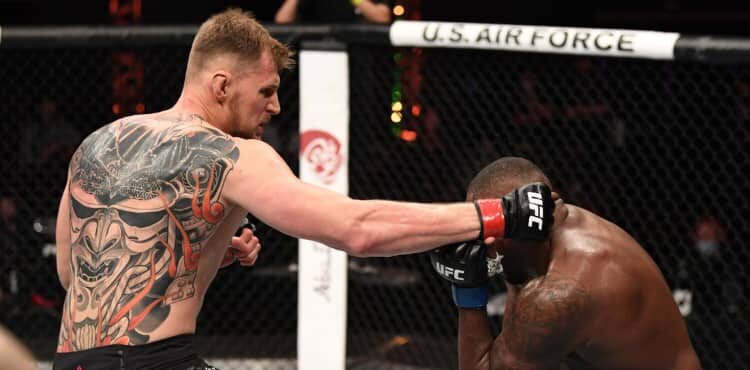 Alexander Volkov punches Walt Harris at UFC 254