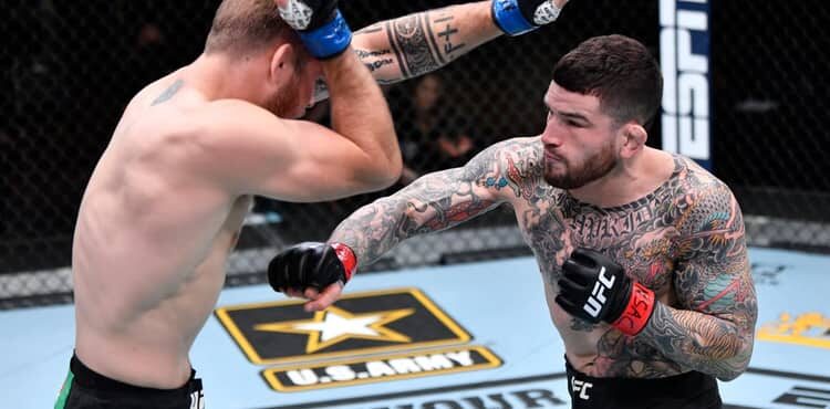 Sean Brady punches Jake Matthews at UFC 259